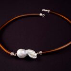 Silver necklace with parts covered in pvc. AR 505-AR